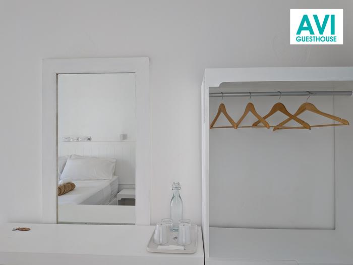 Open wardrobe, mirror and welcome tray